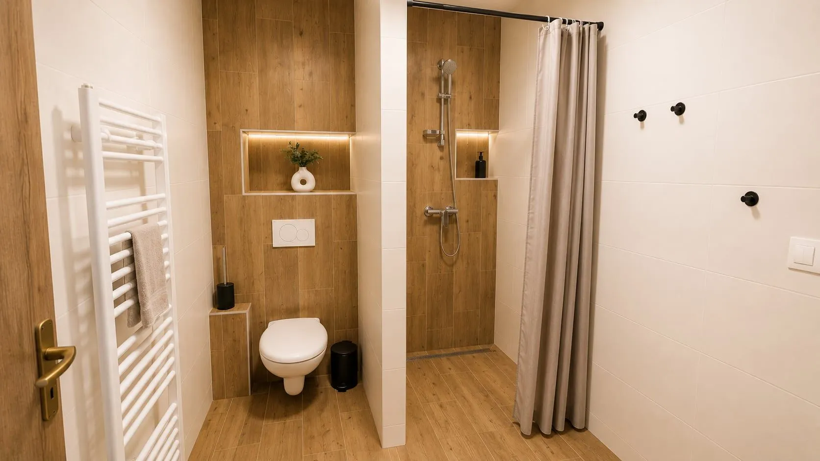 Moderná kúpeľňa so sprchovacím kútom v Penzióne Alma